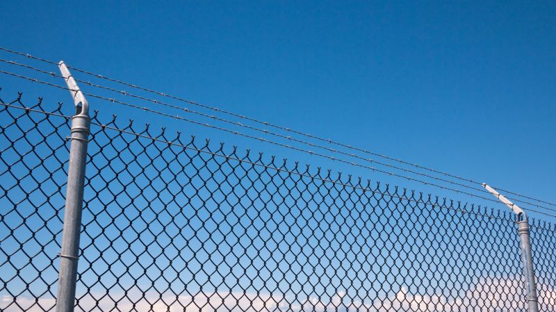 Perimeter Fence with Barbed Wire